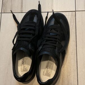 Replicas all black leather sneakers
